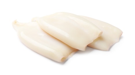 Photo of Pieces of raw squids isolated on white