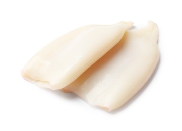 Photo of Pieces of raw squids isolated on white