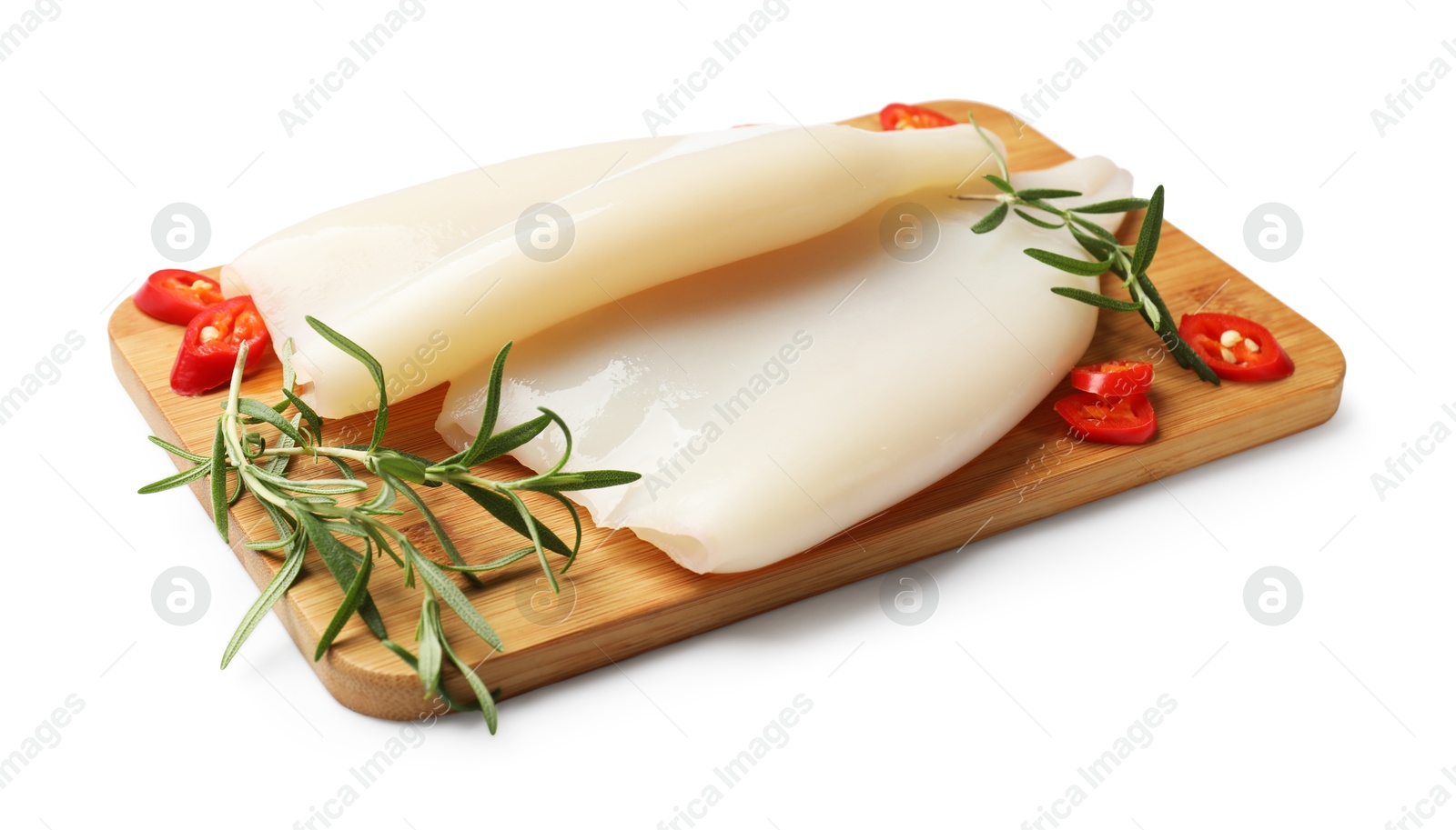 Photo of Pieces of raw squids with rosemary and chili pepper isolated on white