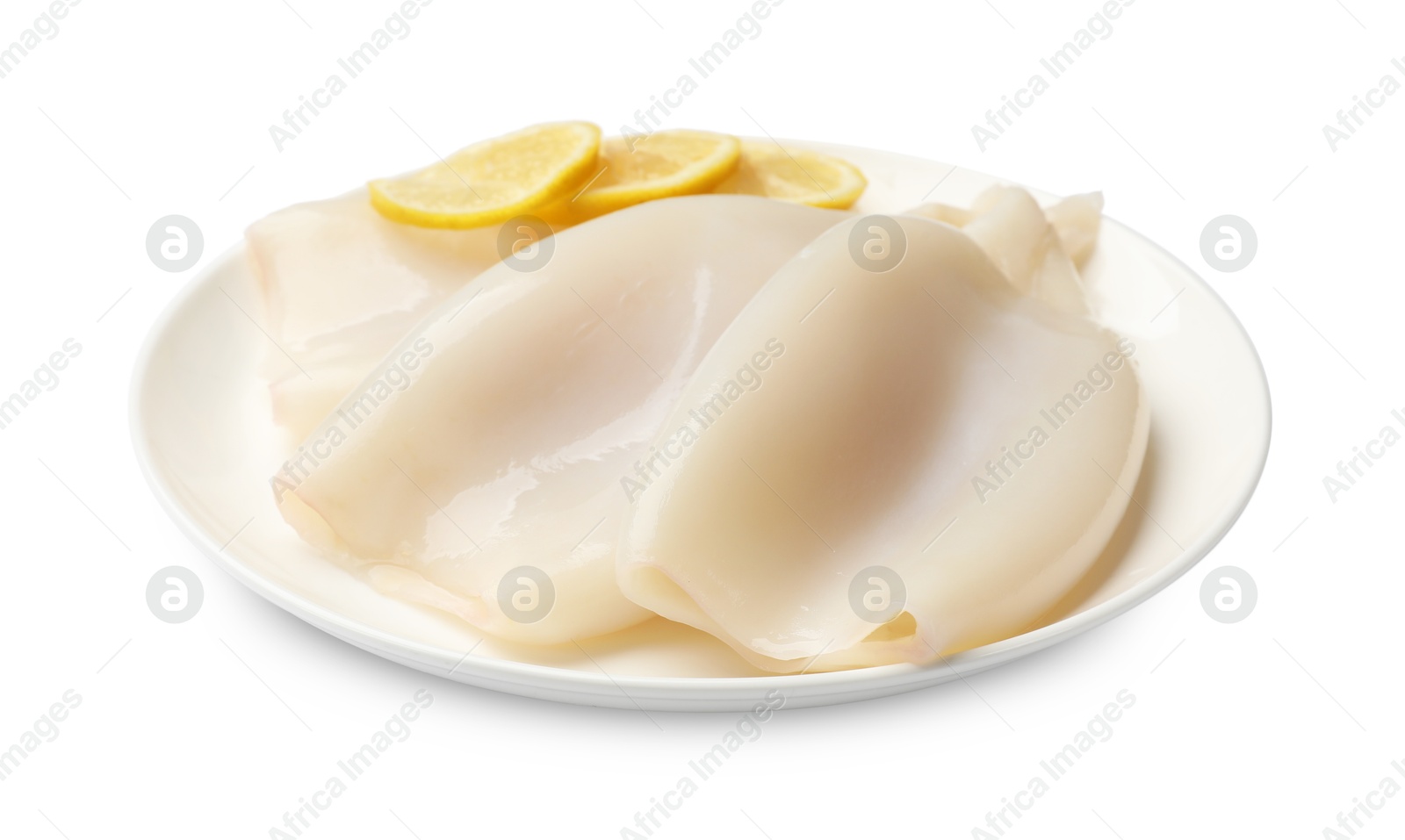 Photo of Pieces of raw squids with lemon isolated on white