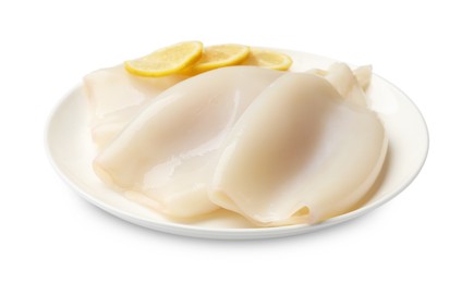 Photo of Pieces of raw squids with lemon isolated on white