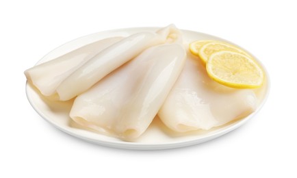 Photo of Pieces of raw squids with lemon isolated on white