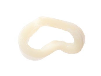 Photo of One raw squid ring isolated on white