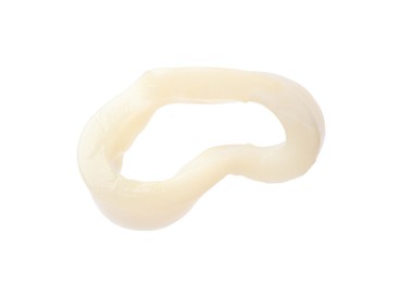 Photo of One raw squid ring isolated on white