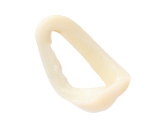 Photo of One raw squid ring isolated on white