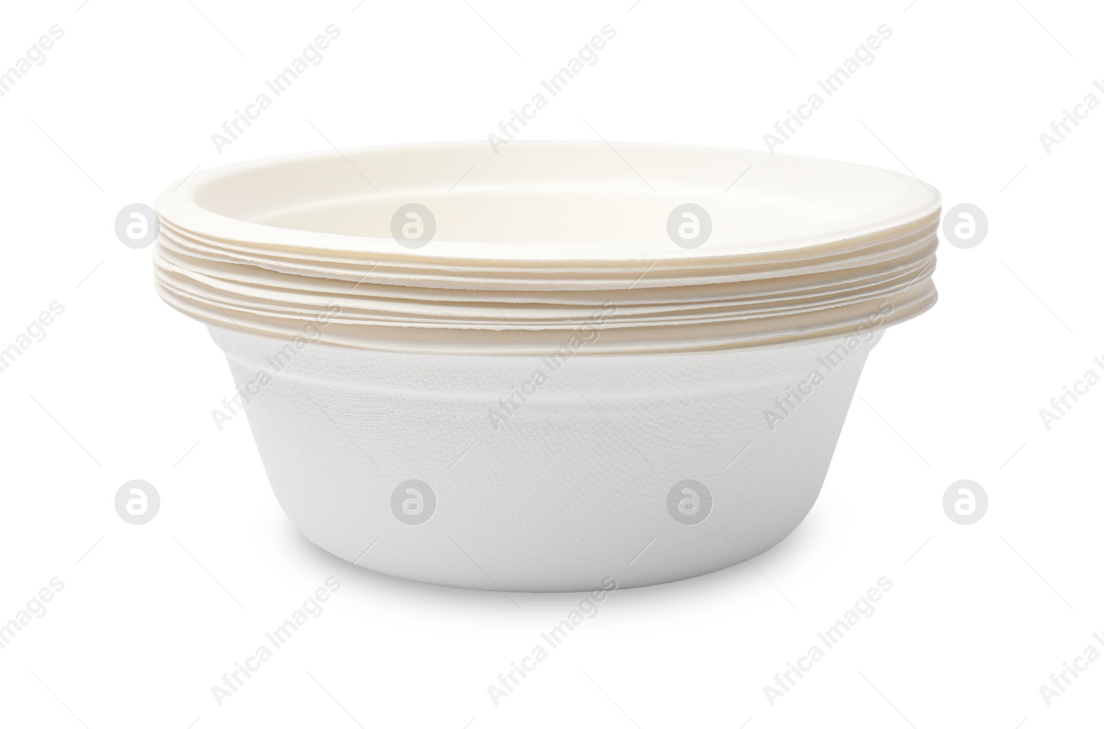 Photo of Disposable tableware. Stack of paper bowls isolated on white
