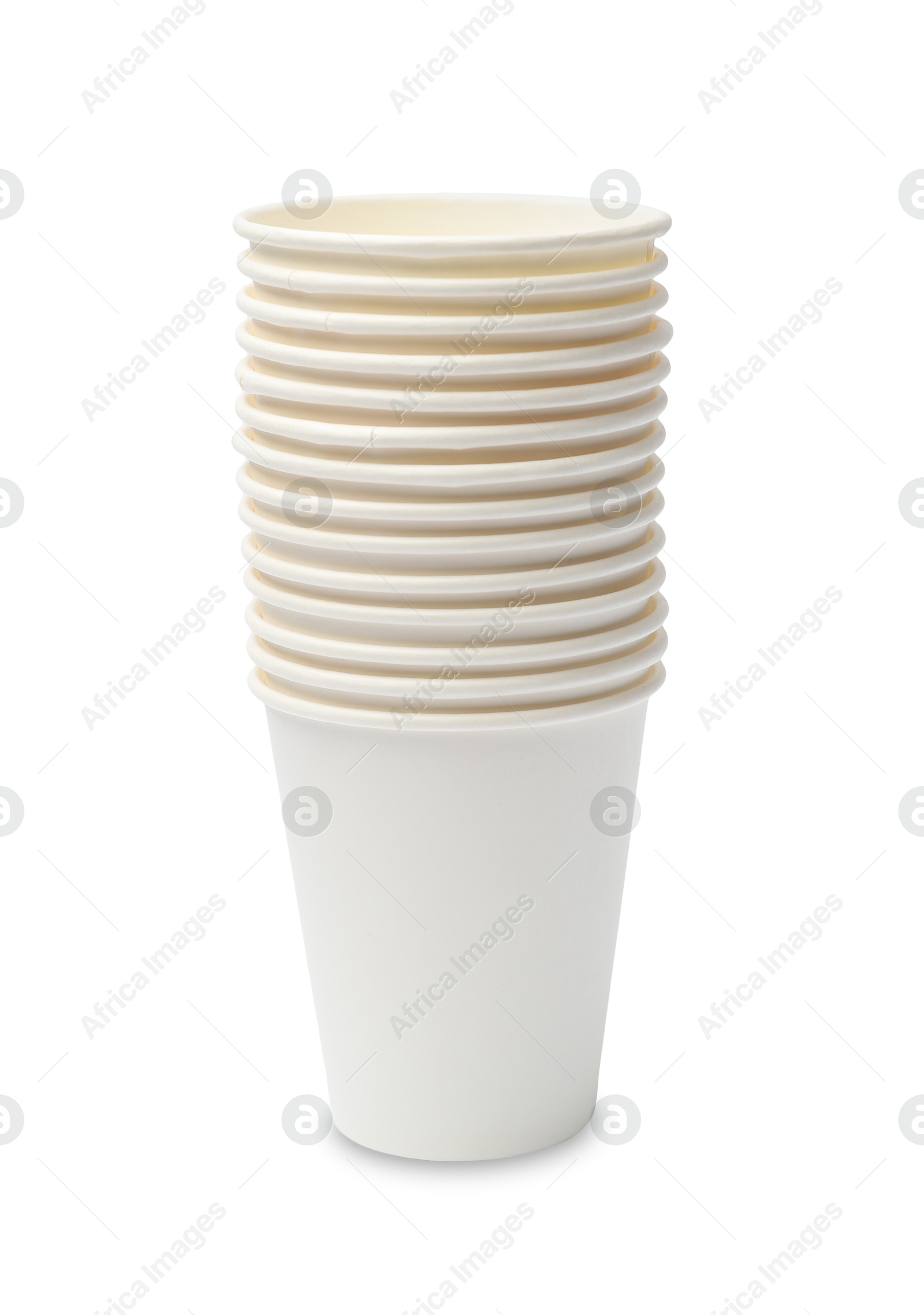 Photo of Disposable tableware. Stack of paper cups isolated on white