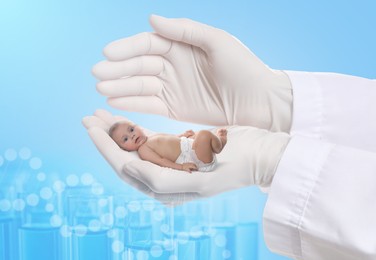Image of In vitro fertilization (IVF). Doctor holding little baby in hand against light blue background with test tubes and DNA