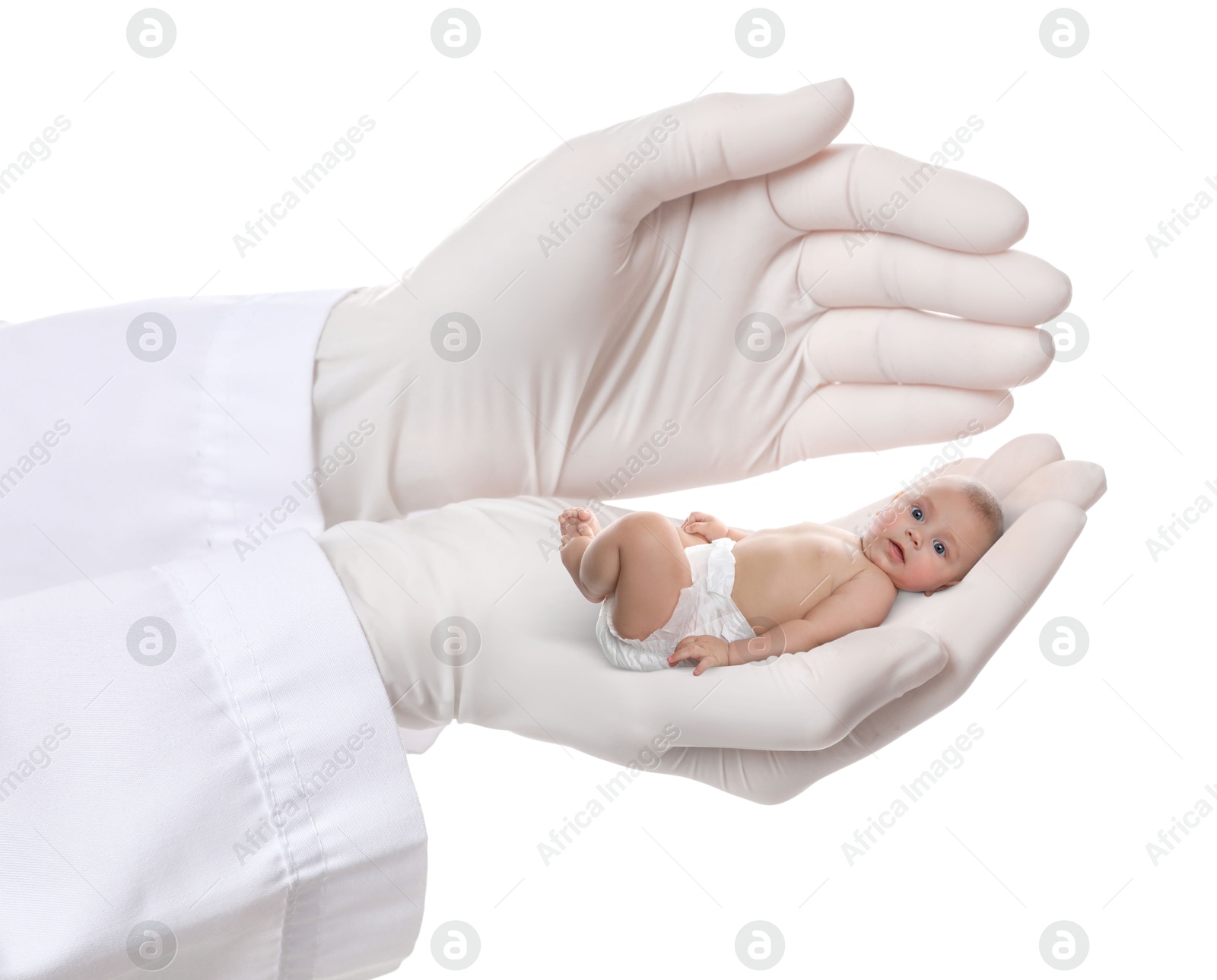Image of In vitro fertilization (IVF). Doctor holding little baby in hand against white background