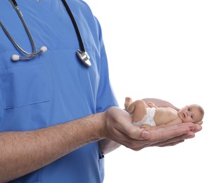 Image of In vitro fertilization (IVF). Doctor holding little baby in hands against white background