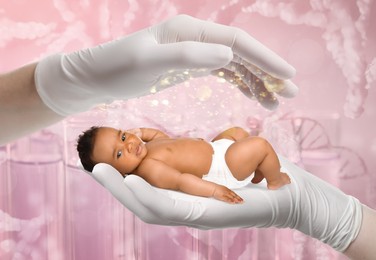 Image of In vitro fertilization (IVF). Doctor holding little baby in hand against pink background with test tubes and DNA