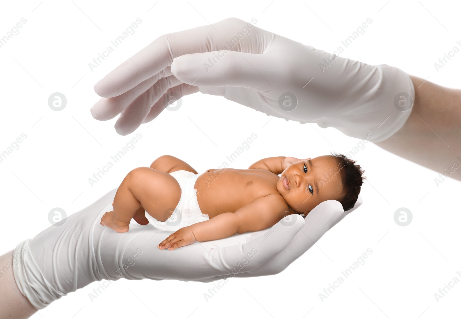 Image of In vitro fertilization (IVF). Doctor holding little baby in hand against white background
