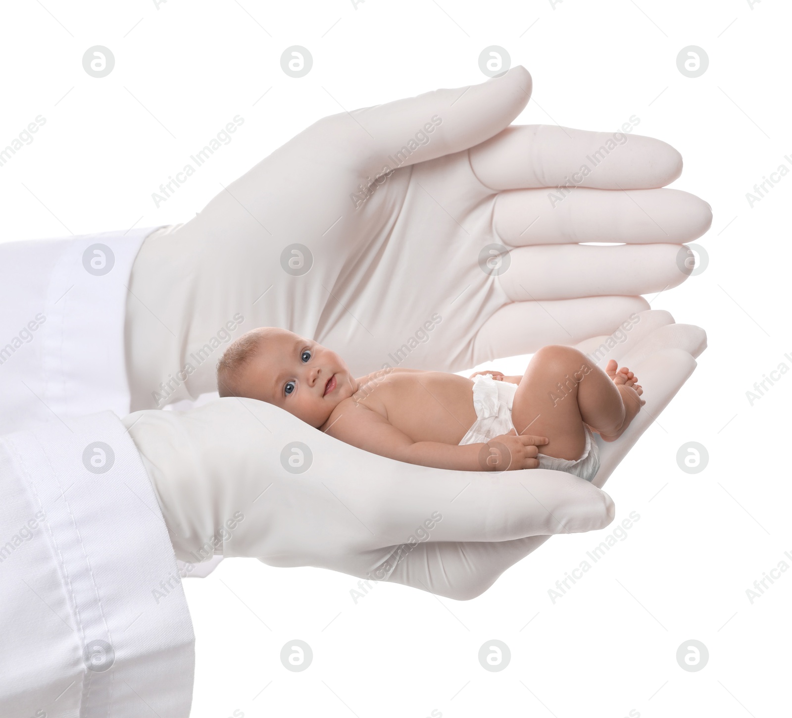 Image of In vitro fertilization (IVF). Doctor holding little baby in hand against white background