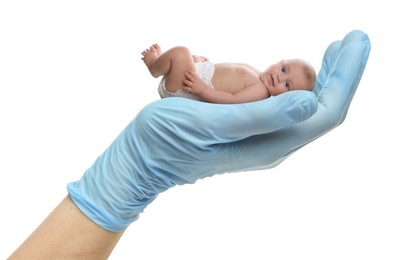Image of In vitro fertilization (IVF). Cute little baby in doctor's hand against white background