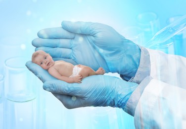 Image of In vitro fertilization (IVF). Doctor holding little baby in hand against light blue background. Double exposure with test tubes