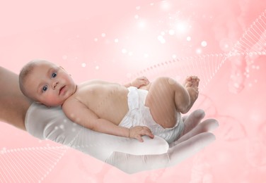 Image of In vitro fertilization (IVF). Cute little baby in doctor's hand against pink background with DNA