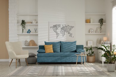 Image of Living room with pale blue sofa and other furniture. Interior design