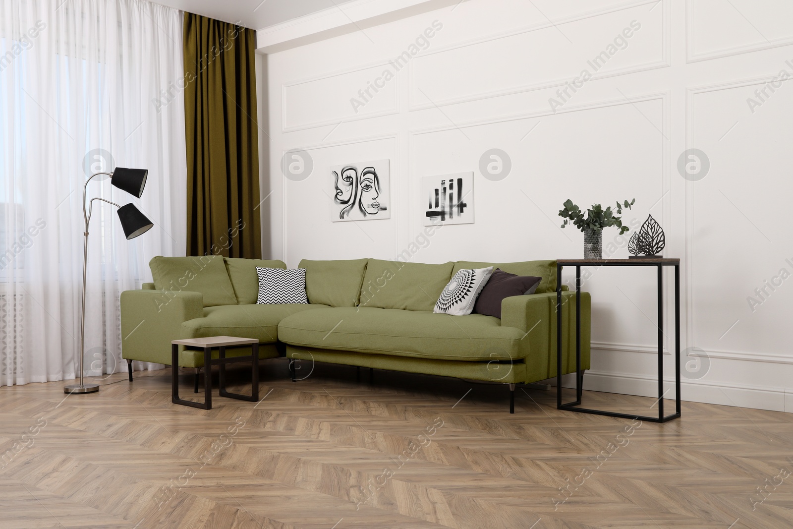 Living room with olive color sofa and other furniture. Interior design Image of Living room with olive color sofa and other furniture. Interior design