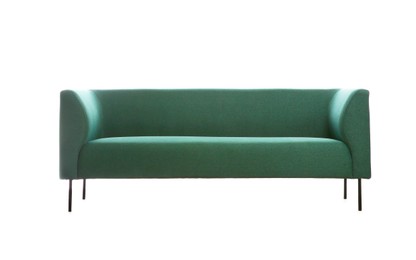Photo of Comfortable green sofa and rug on white background. Furniture for living room interior