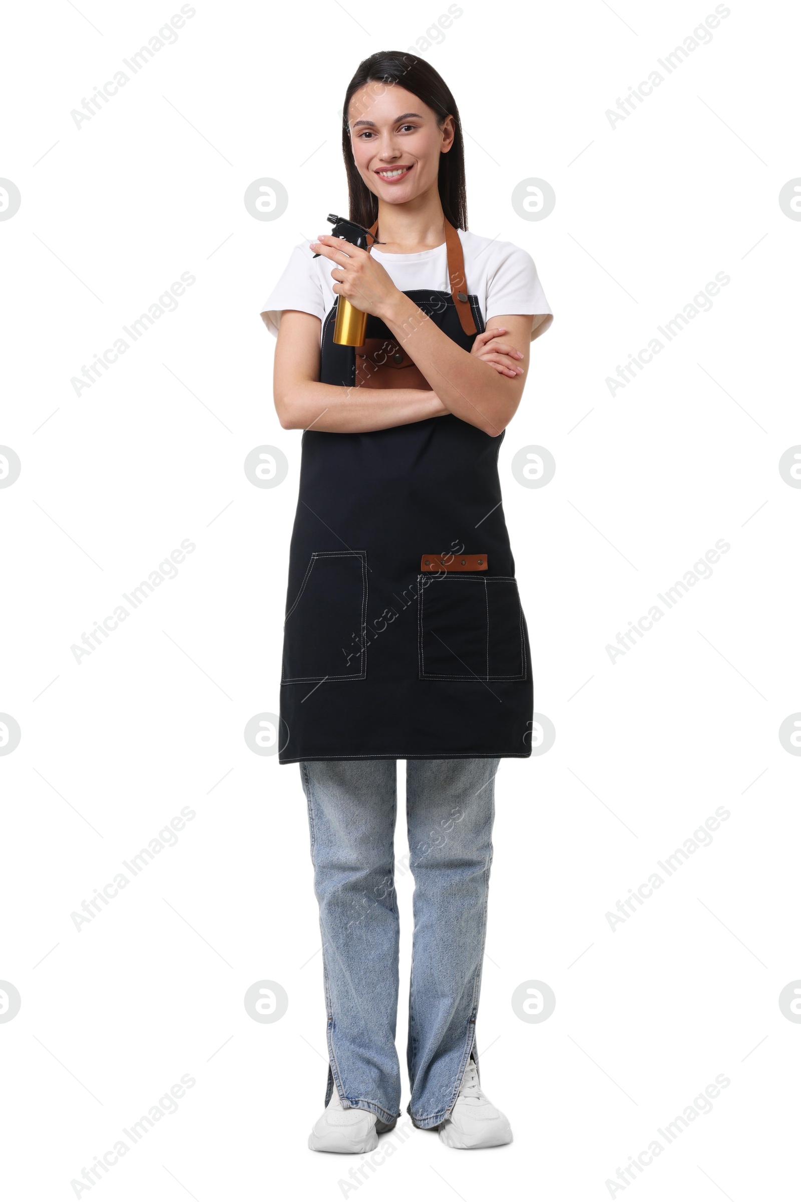 Photo of Hairdresser in apron with spray bottle on white background