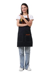Photo of Hairdresser in apron with spray bottle on white background