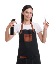 Photo of Portrait of hairdresser in apron with scissors and spray bottle on white background