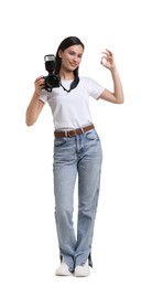 Photo of Photographer with professional camera showing ok gesture on white background