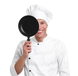 Photo of Portrait of professional chef in uniform with frying pan on white background