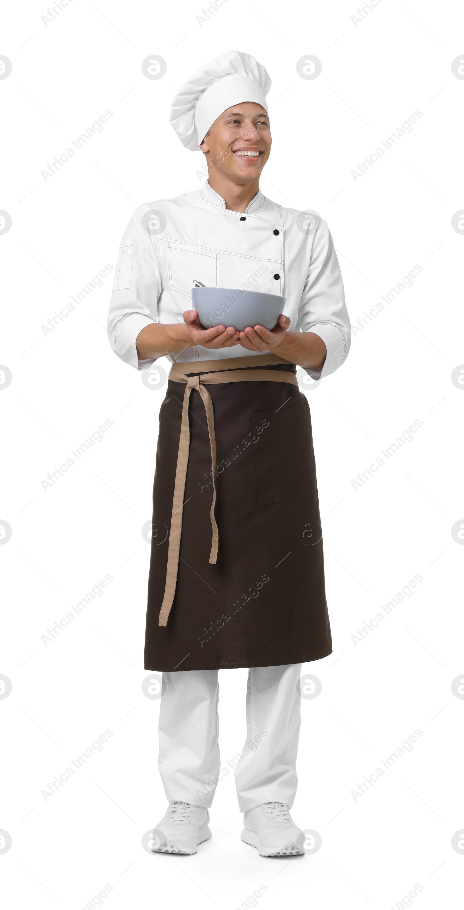 Photo of Professional chef in uniform with bowl on white background