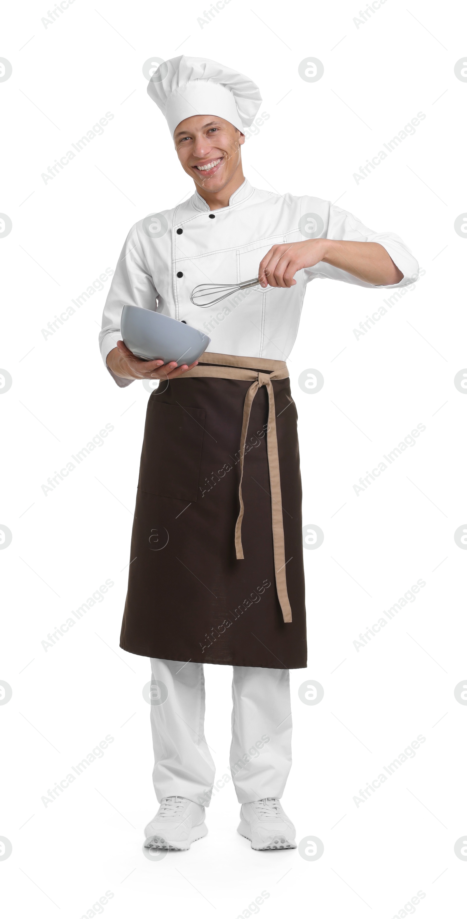 Photo of Professional chef in uniform with bowl and whisk on white background