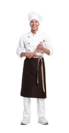 Photo of Professional chef in uniform with rolling pin on white background
