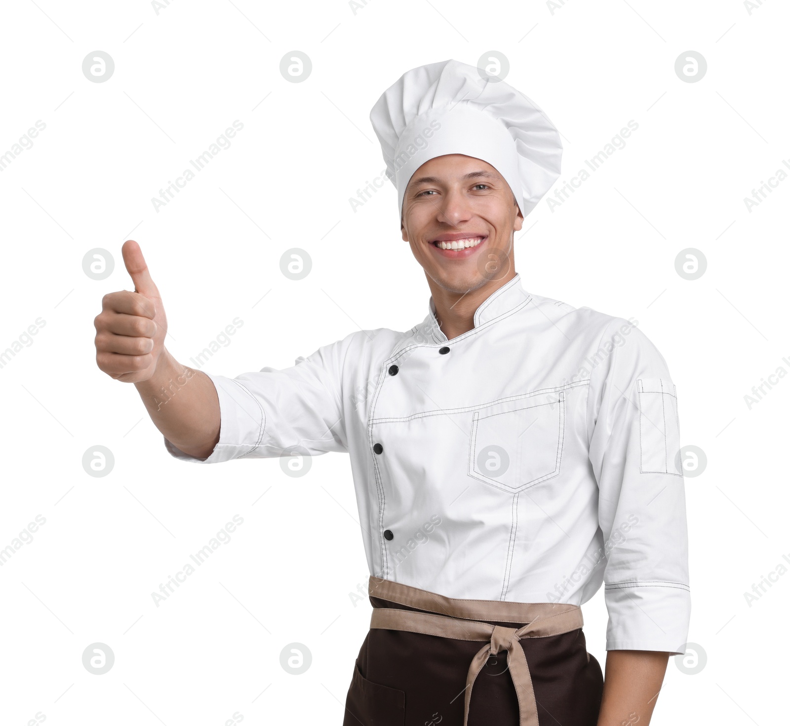 Photo of Portrait of professional chef in uniform showing thumbs up on white background