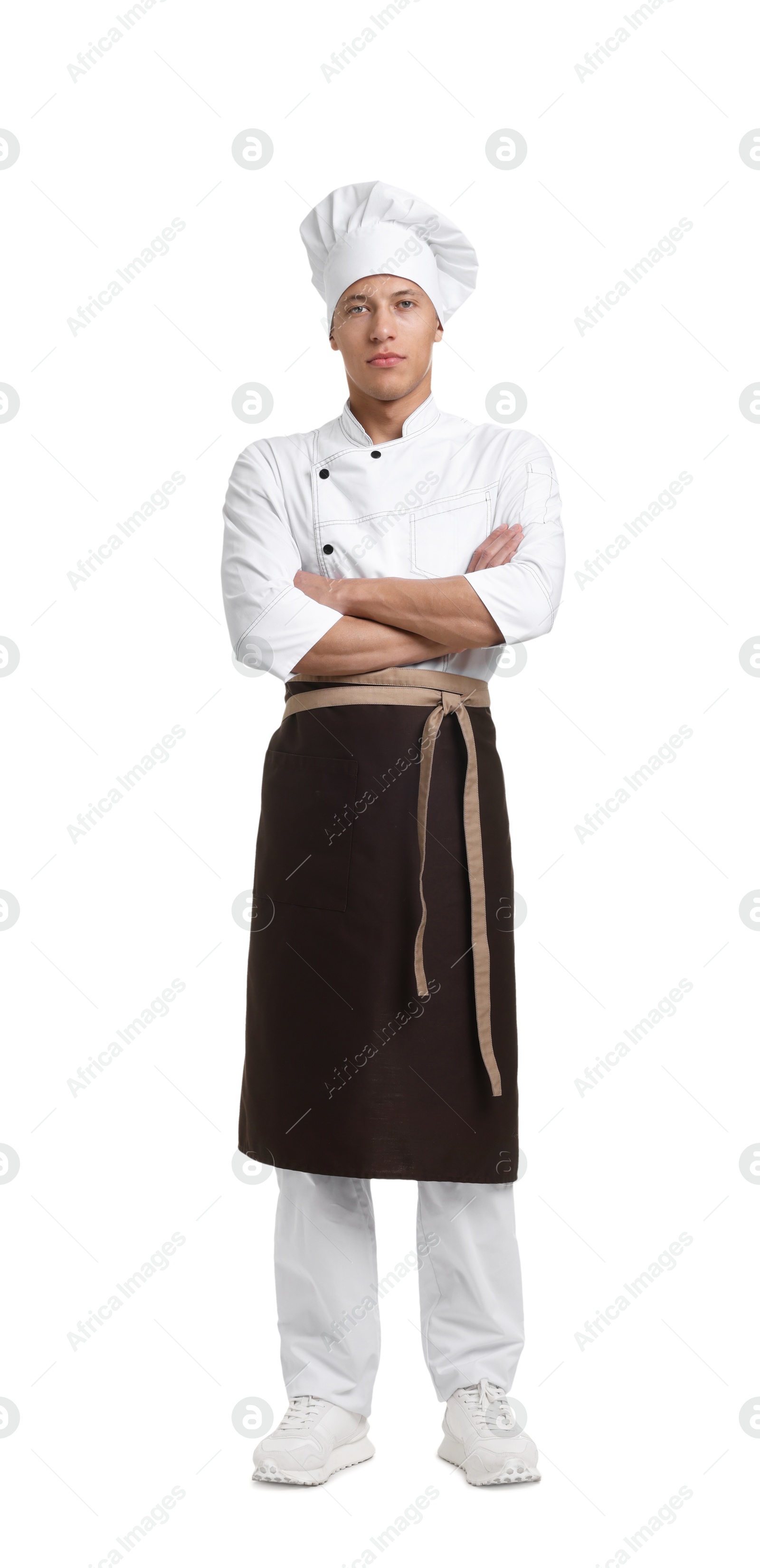 Photo of Full-length portrait of professional chef in uniform on white background