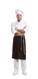 Photo of Full-length portrait of professional chef in uniform on white background