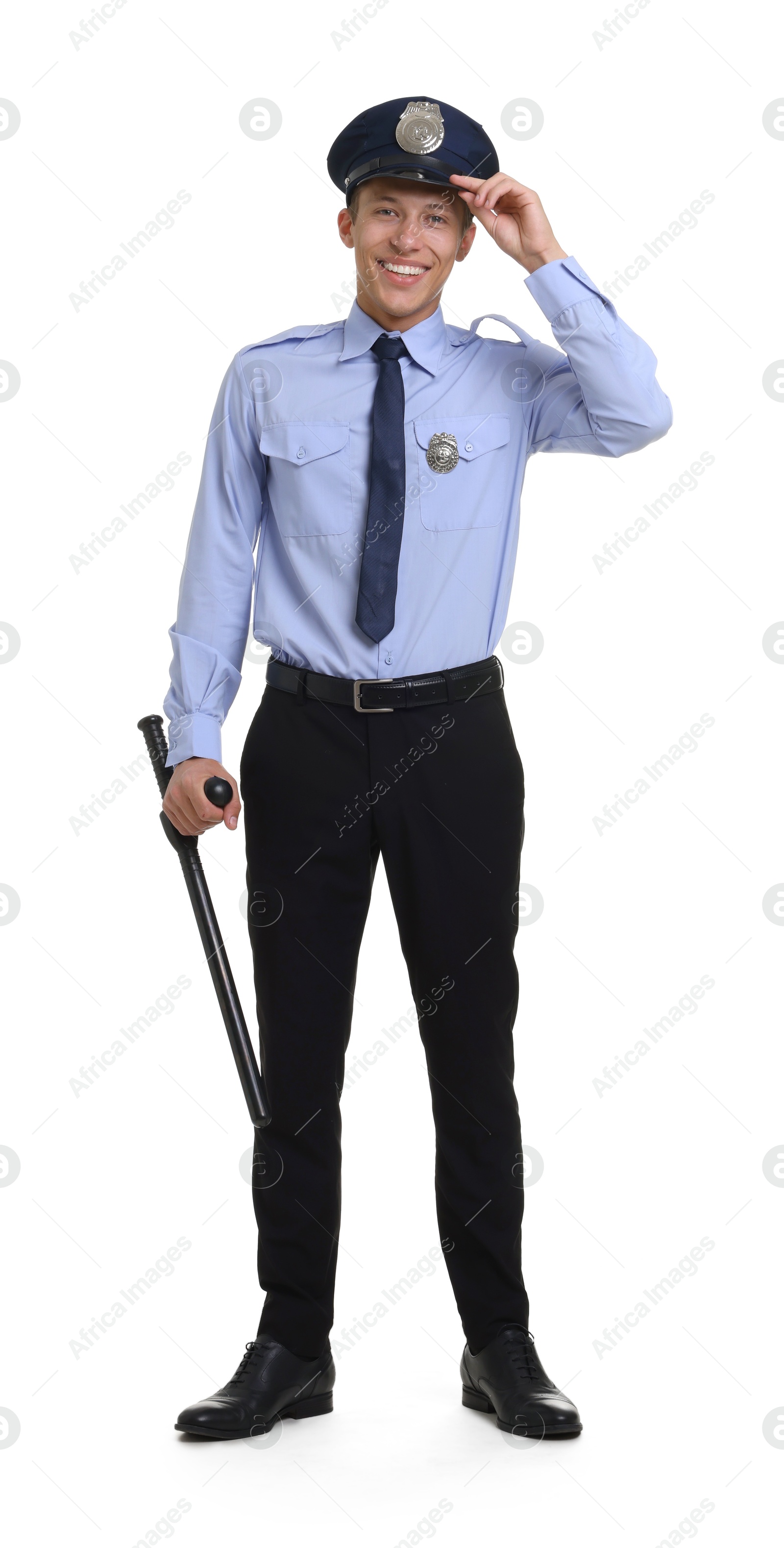 Photo of Young policeman in uniform with baton isolated on white