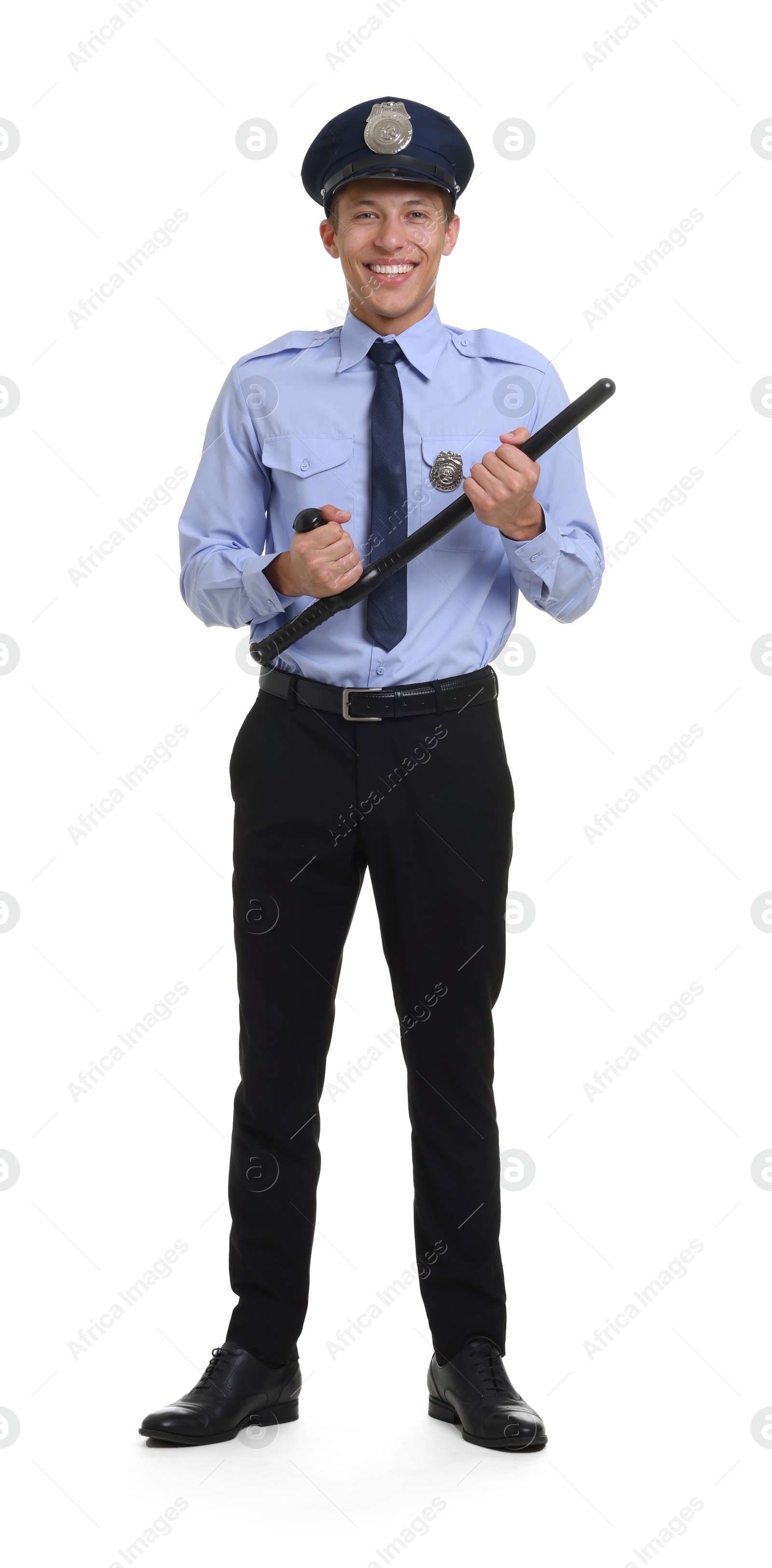 Photo of Young policeman in uniform with baton isolated on white