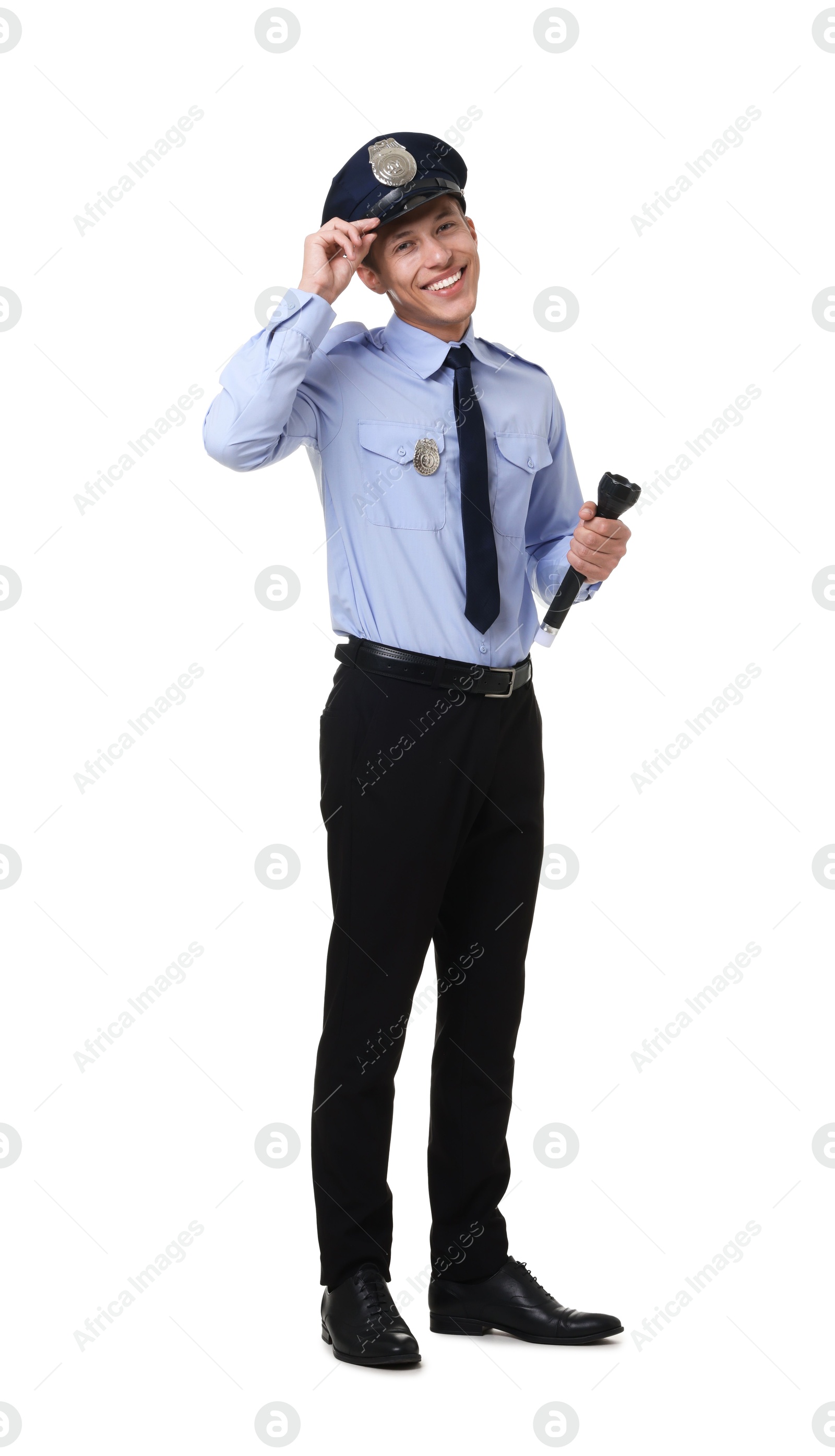 Photo of Young policeman in uniform with flashlight isolated on white