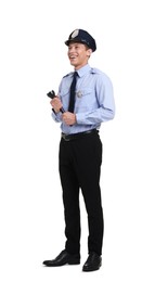 Photo of Young policeman in uniform with flashlight isolated on white