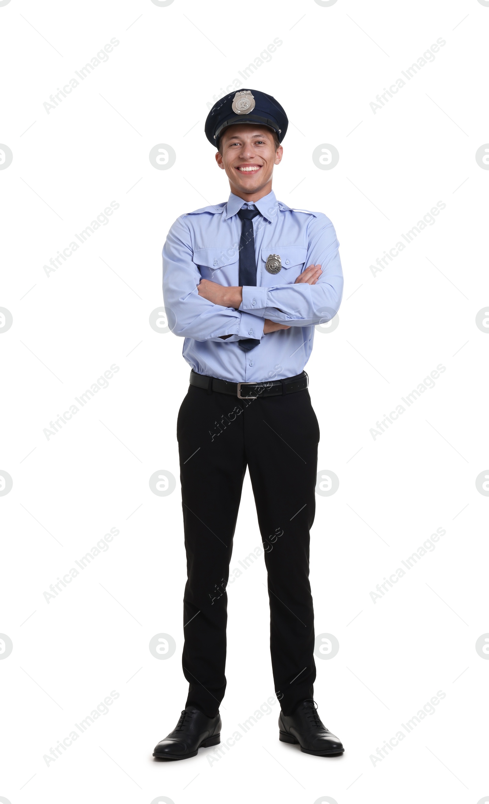 Photo of Young policeman in uniform isolated on white