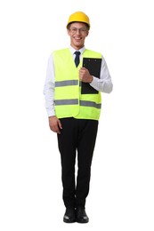 Photo of Young engineer in hard hat and reflective vest with clipboard on white background