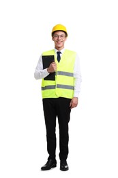 Photo of Young engineer in hard hat and reflective vest with clipboard on white background