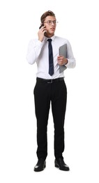 Photo of Young businessman with laptop talking on phone on white background