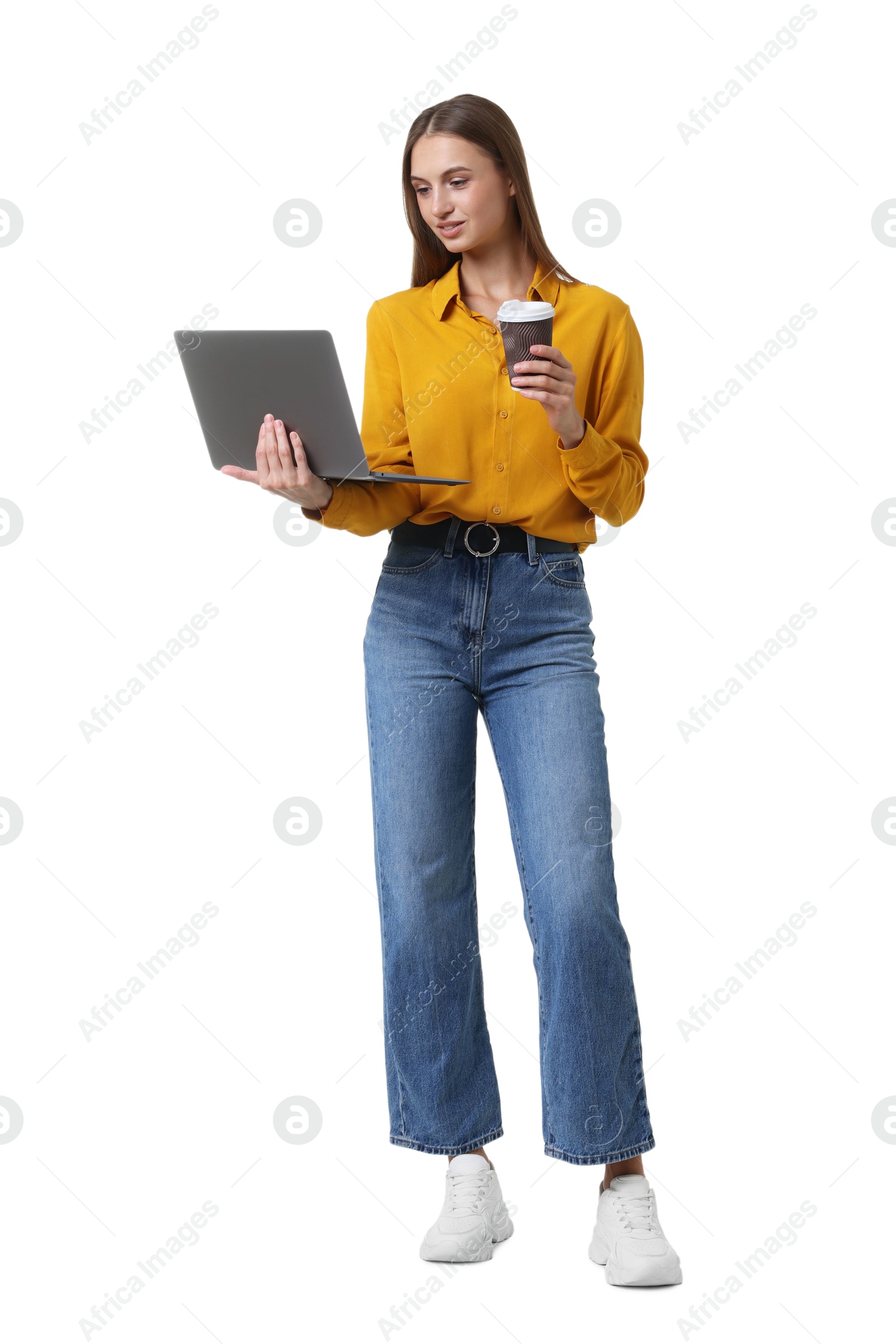 Photo of Young woman with laptop and cup of drink on white background