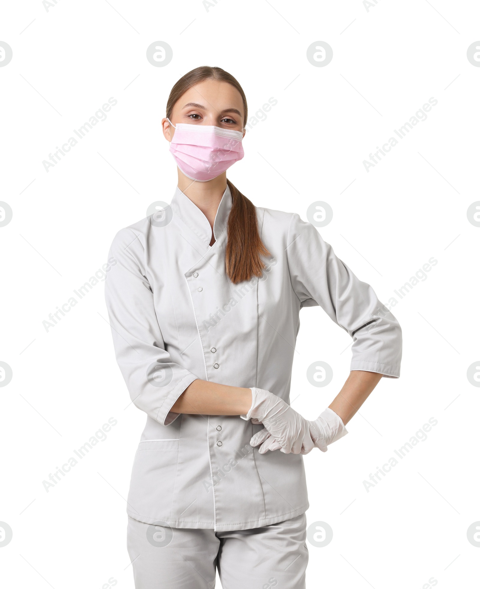 Photo of Portrait of nurse in uniform and medical mask on white background