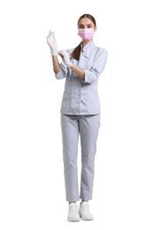 Photo of Full-length portrait of nurse in uniform and medical mask on white background