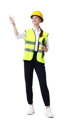 Photo of Young engineer in hard hat and reflective vest with clipboard on white background