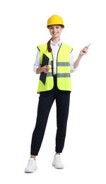 Photo of Young engineer in hard hat and reflective vest with clipboard on white background
