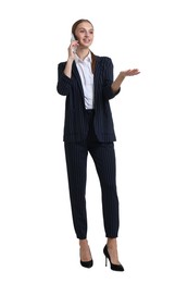 Photo of Young businesswoman in stylish suit talking on phone on white background