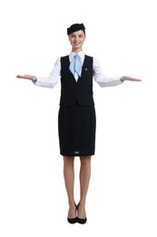 Photo of Young stewardess in uniform on white background