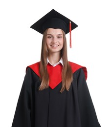 Photo of Portrait of happy young woman in graduation gown and mortarboard on white background